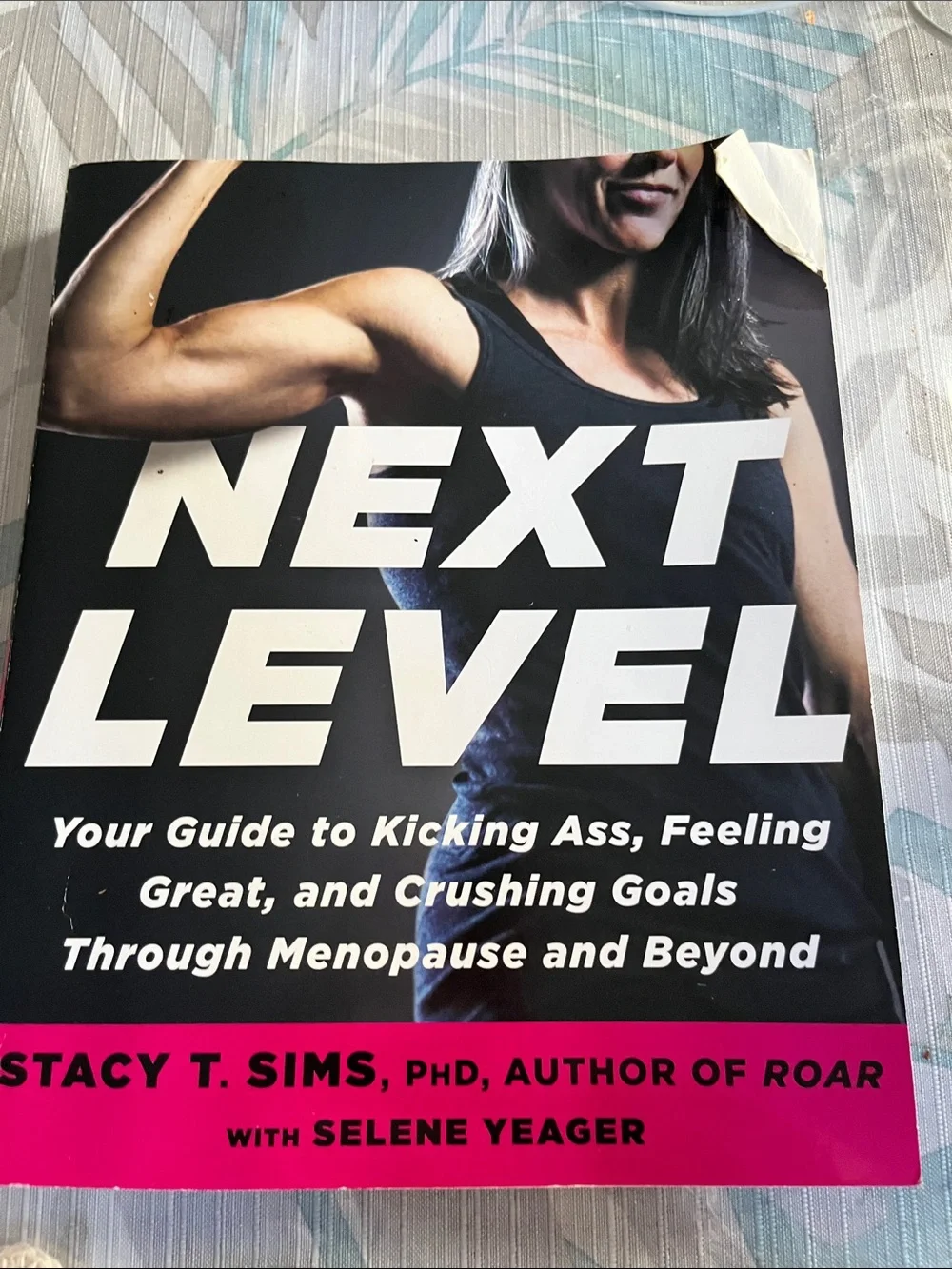 Next Level by Stacy T. Sims - Fitness & Menopause Guide (Black/Pink) - Picture 1 of 1